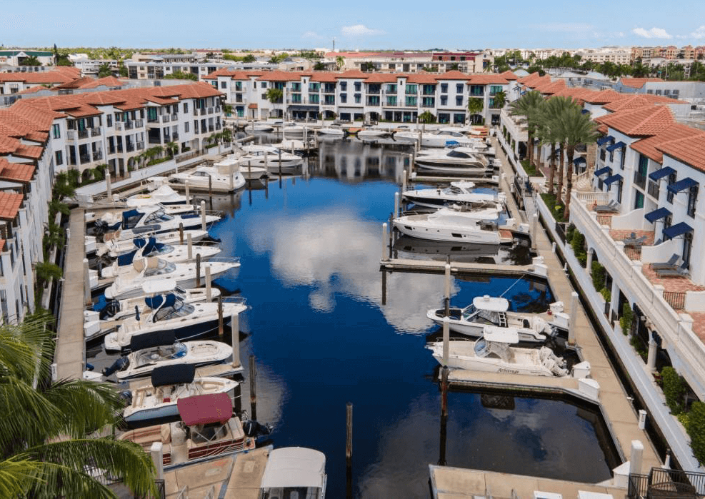 South Florida marina with private docks, boat lifts, and seawall — typical Palm Beach Dredging job site